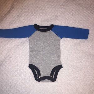 Lone sleeve onesie